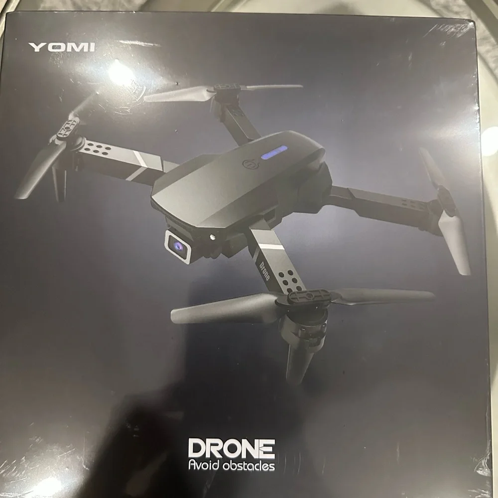 Sleek Black Drone with Advanced Obstacle Avoidance